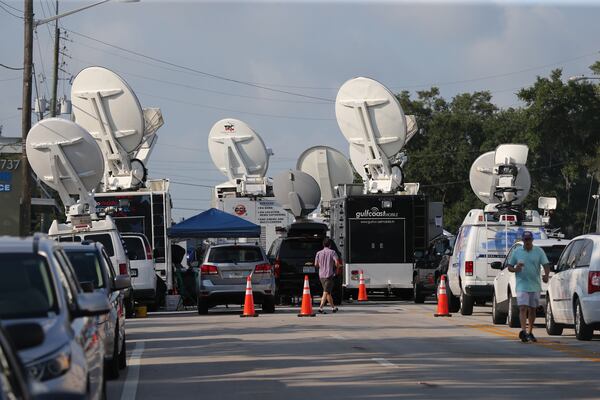  Scores of news trucks were set up in downtown Orlando for days after the Pulse nightclub attack in June 2016. AJC photo: Curtis Compton