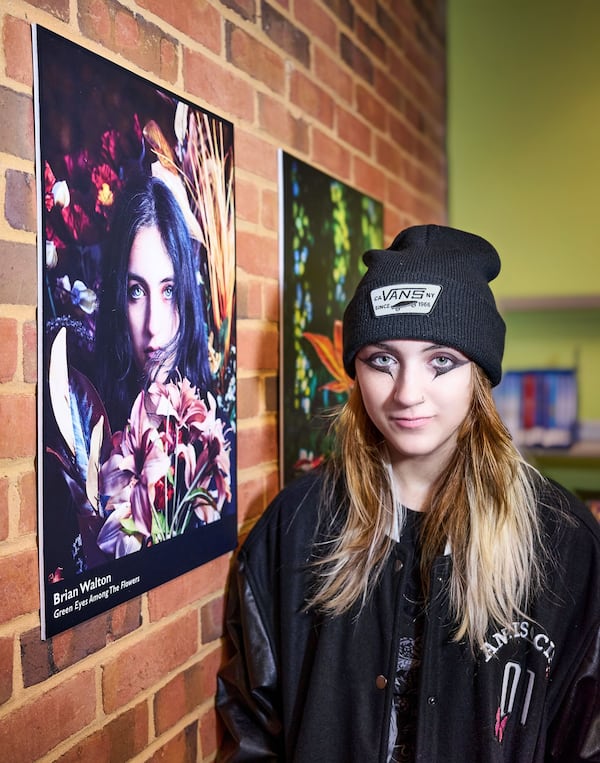 At the Peachtree Corners Gallery Grand Opening, Jay was the subject in the photo “Green Eyes Among the Flowers,” by Brian Walton. Photo courtesy of Brian Walton Photography.