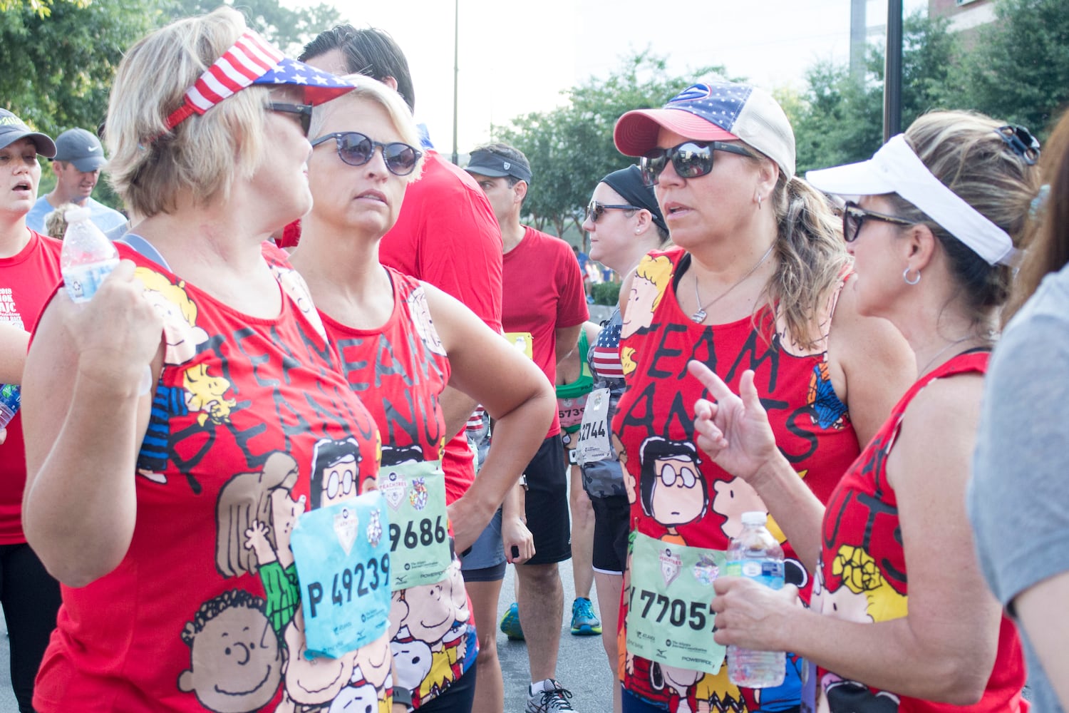 Runners show fashion flair during AJC Peachtree Road Race