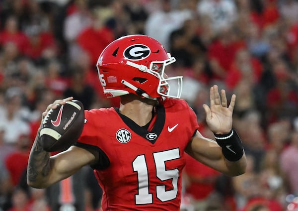 Georgia's quarterback Carson Beck (15) gets off a pass during the first half in an NCAA football game at Sanford Stadium, Saturday, September 23, 2023, in Athens. (Hyosub Shin / Hyosub.Shin@ajc.com)