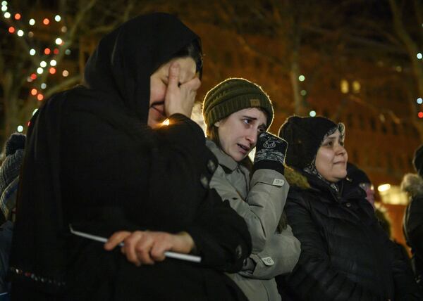 Mourners attend a candlelight vigil held Wednesday, Feb. 20, 2019, in Halifax, Nova Scotia, for seven Syrian refugee children killed in a fire at their home in the Spryfield community of Halifax the day before. The children’s parents, Ebraheim and Kawthar Barho, who sought refuge for their family in September 2017, survived the fire, but Ebraheim Barho suffered life-threatening injuries when he went back into the burning home in an attempt to save the children, ages 14 to 4 months.