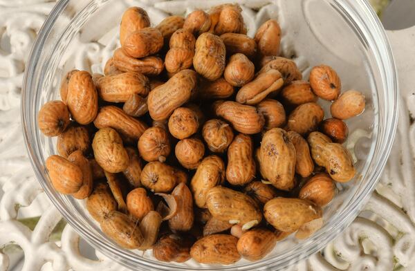 Boiled peanuts are offered to visitors during a tour of Longleaf Ridge.  (Chris Hunt for The Atlanta Journal-Constitution)