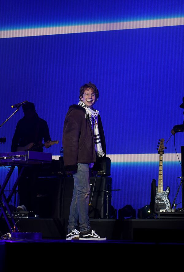  Charlie Puth shares a smile with the crowd. Photo: Ryon Horne/AJC