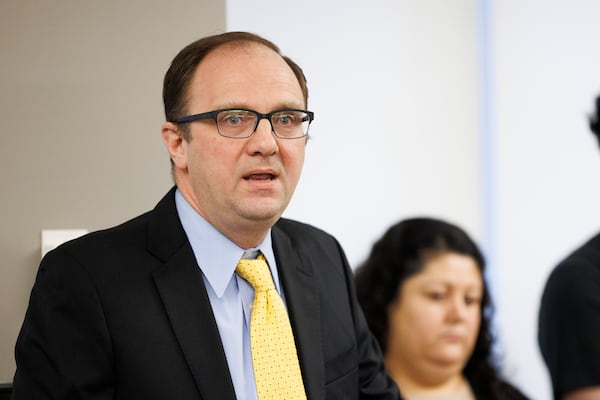 Mark Fleming, Associate Director of Litigation at National Immigrant Justice Center and Lawyer, speaks about the unlawful arrests of 22 individual's during a press conference to announce a court action to prevent unlawful arrests the at the offices of the National Immigrant Justice Center Monday, March 17, 2025, in Chicago. (Anthony Vazquez/Chicago Sun-Times via AP)