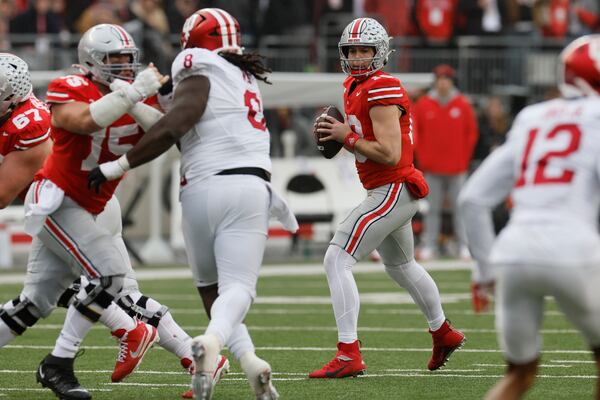 Ohio State quarterback Will Howard drops back to pass against Indiana during the first half of an NCAA college football game Saturday, Nov. 23, 2024, in Columbus, Ohio. (AP Photo/Jay LaPrete)