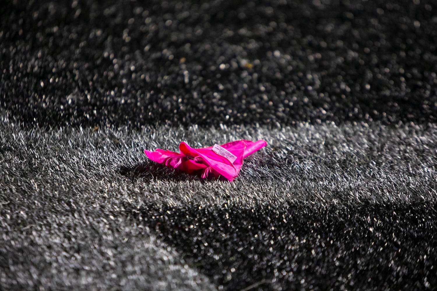 Referees throw pink flags for breast cancer awareness during the Alpharetta vs. Blessed Trinity high school football game on Friday, October 28, 2022, at Alpharetta high school in Alpharetta, Georgia. Alpharetta led Blessed Trinity 21-7 at the end of the first half.