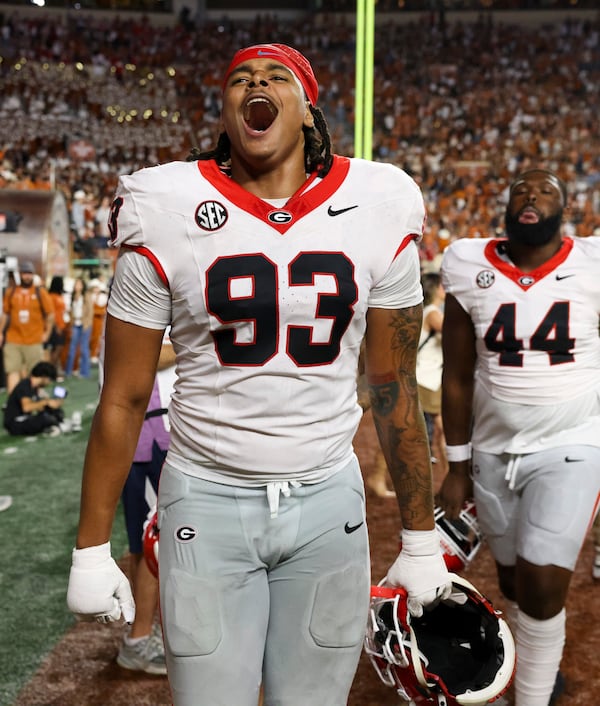 Georgia defensive lineman Tyrion Ingram-Dawkins (93) celebrates their 30-15 win against Texas at Darrel K Royal Texas Memorial Stadium, Saturday, October 19, 2024, in Austin, Tx. (Jason Getz / AJC)

