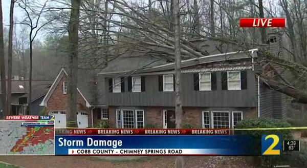 Strong storms moving through North Georgia knocked down trees Friday afternoon.