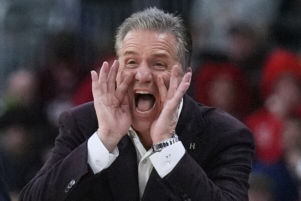 Arkansas head coach John Calipari calls to his players during the second half in the first round of the NCAA college basketball tournament, Thursday, March 20, 2025, in Providence, R.I. (AP Photo/Charles Krupa)