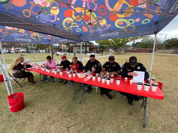 Judges at the Suwanee Chili Cook Off & Music Festival sample and score chilis. This year’s event is scheduled for Nov. 9. Courtesy of  Suwanee Chili Cook Off & Music Festival