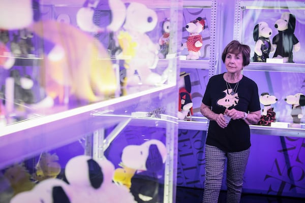 Jeannie Schulz, widow of Charles M. Schulz, tours the Snoopy In Style exhibition that runs from March 22 through April 5, in Paris Thursday, March 20, 2025. (AP Photo/Thomas Padilla)