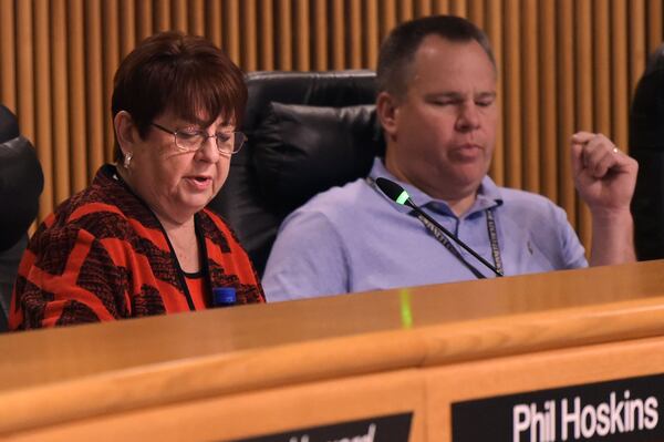 8/1/18 - Atlanta - Gwinnett's Board of Commissioners Chair Charlotte Nash, left, announces the approval of a new contract with MARTA on Wednesday, August 1 at the Gwinnett Justice and Administration Center auditorium. Commissioner Tommy Hunter, District 3, is right. (Jenna Eason / Jenna.Eason@coxinc.com)