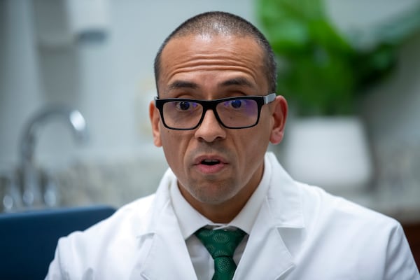 Pediatric endocrinologist Dr. Hector Granados speaks during an interview at his private practice in El Paso, Texas, Tuesday, Jan. 21, 2025. (AP Photo/Andres Leighton)