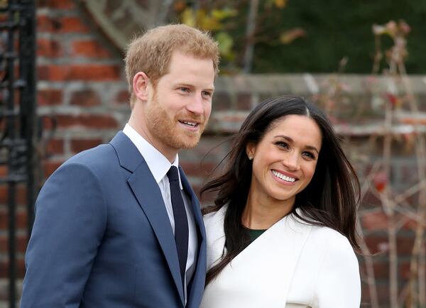 LONDON, ENGLAND - NOVEMBER 27:  Prince Harry and actress Meghan Markle during an official photocall to announce their engagement at The Sunken Gardens at Kensington Palace on November 27, 2017 in London, England.  Prince Harry and Meghan Markle have been a couple officially since November 2016 and are due to marry in Spring 2018.  (Photo by Chris Jackson/Chris Jackson/Getty Images)