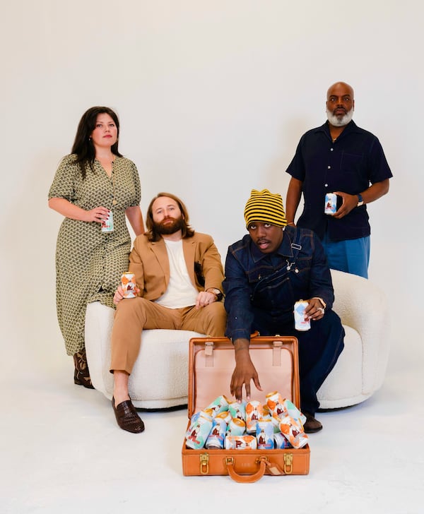 Rachel and Peter Kiley pose with Miles "Lil Yachty" McCollum and Kevin "Coach K" Lee with Yacht Water, the tequila seltzer they own.