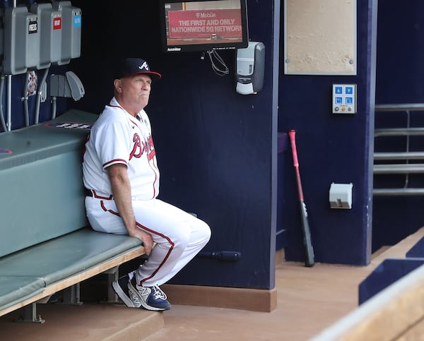 Braves manager Brian Snitker sits in the dugout during the game against the Washington Nationals on Wednesday, June 2, 2021, at Truist Park in Atlanta.  (Curtis Compton / Curtis.Compton@ajc.com)