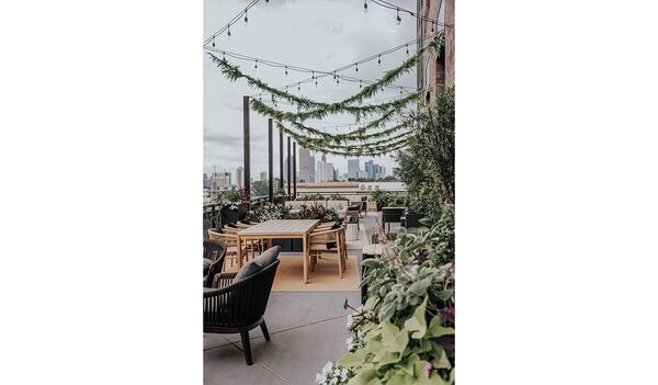 The terrace at Drawbar offers a view of Midtown Atlanta. Courtesy of Caleb Jones Photography