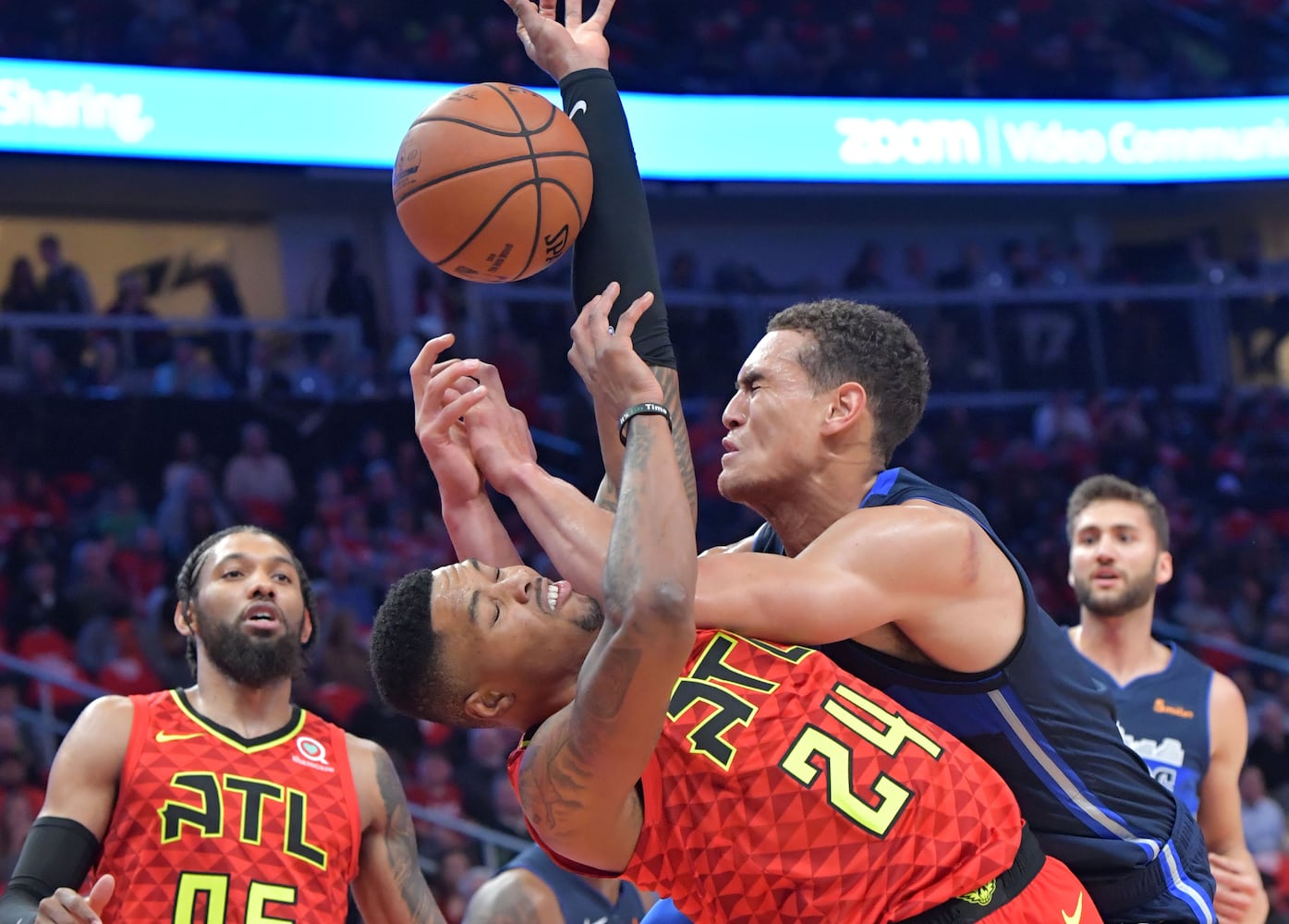 Photos: Hawks rally to beat Mavs in home opener