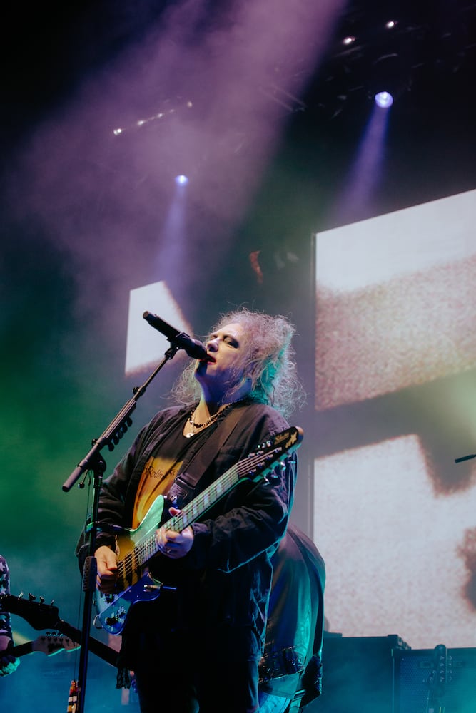 The Cure performs to an excited crowd at the State Farm Arena on June 27, 2023. (Sophie Harris for The Atlanta Journal-Constitution).