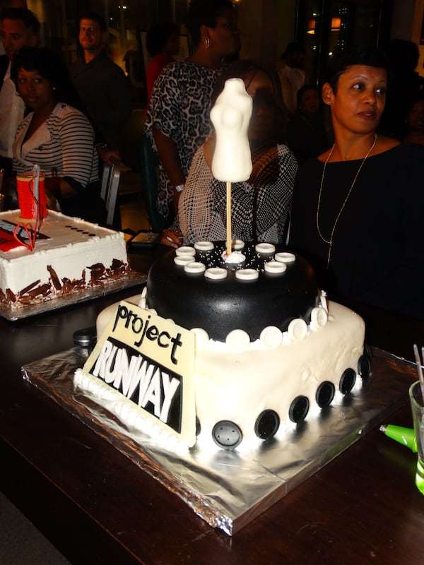 A former hair stylist customer and friend Akieme Evans spent a day and half putting this cake together for Edmond. CREDIT: Rodney Ho/ rho@ajc.com