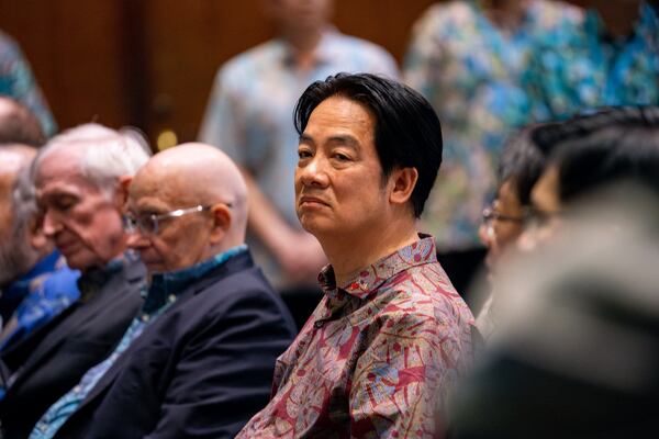 Taiwanese President Lai Ching-te looks on before an informal private discussion during a transit stopover in Hawaii en route to visit several Pacific Islands, at the East-West Center, Sunday, Dec. 1, 2024, in Honolulu. (AP Photo/Mengshin Lin)