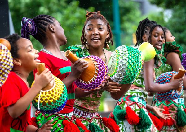 The performing arts collective Egun Omode performs at Centennial Olympic Park for the Juneteenth Atlanta Parade and Music Festival on Saturday, June 19, 2021. (Photo: Steve Schaefer for The Atlanta Journal-Constitution)