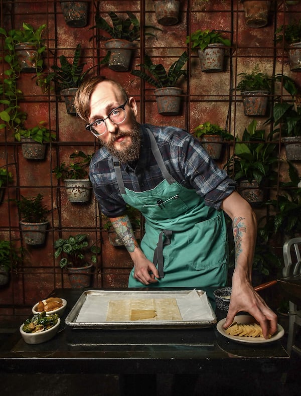 Two Urban Licks executive chef Shain Wancio prepares to show how to build one of his galettes. (Styling by chef Shain Wancio / Chris Hunt for the AJC)