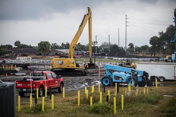 Workers continue the cleanup of the Terry Creek Dredge Spoil Areas/Hercules Outfall Superfund site in Brunswick. (AJC Photo/Stephen B. Morton)
