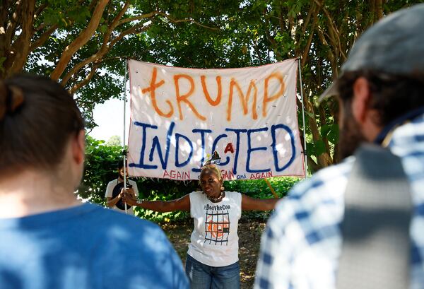 Nadine Seiler from Maryland wears a custom-made headband supporting Fani Willis, speaking with press members outside of the Fulton County Jail on August 23, 2023. She mentioned that she had attended Trump’s three indictments.

Miguel Martinez /miguel.martinezjimenez@ajc.com