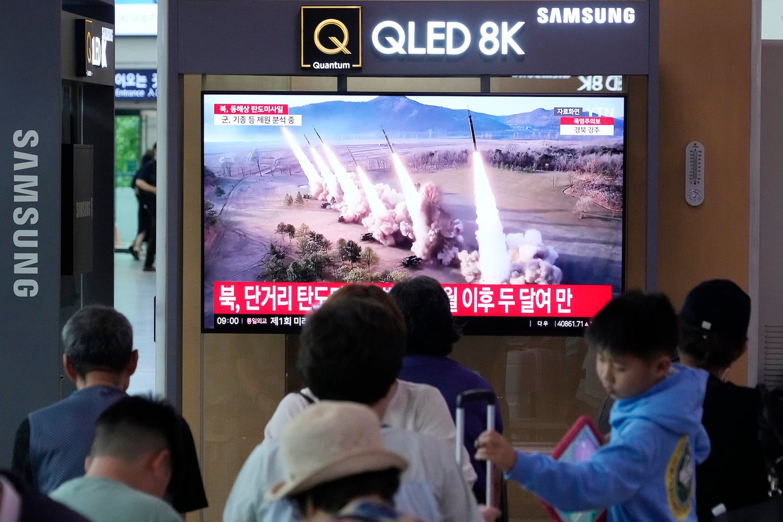 A TV screen shows a file image of North Korea's missiles launch during a news program at Seoul Railway Station in Seoul, South Korea, Thursday, Sept. 12, 2024. (AP Photo/Ahn Young-joon)