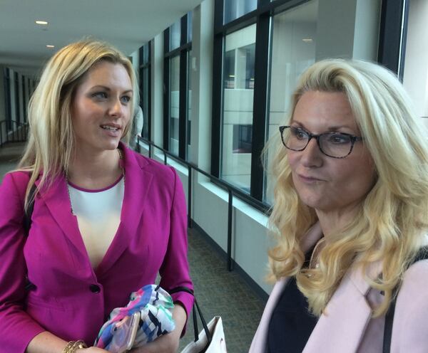 Defense lawyers Ashleigh Merchant (left) and Kim Frye at the Cobb County courthouse.( Photo by Bill Torpy / AJC file)