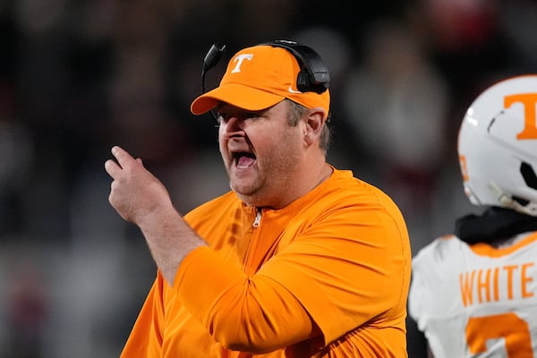 Tennessee head coach Josh Heupel yells to an official during the first half of an NCAA college football game against Georgia , Saturday, Nov. 16, 2024, in Athens, Ga. (AP Photo/John Bazemore)