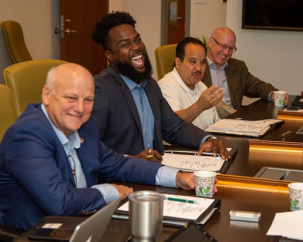 Michel “Marty” Turpeau IV, the Development Authority of Fulton County's chairman and interim executive director, is seen here in a white shirt at a DAFC meeting. (Photo by Phil Skinner)