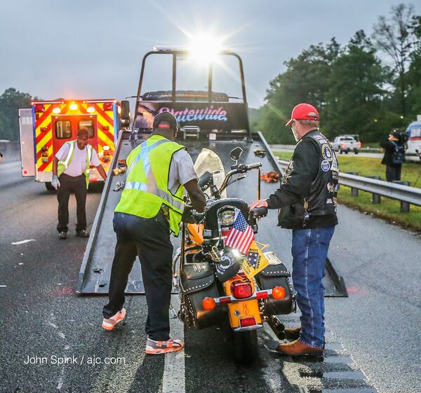 A crash injured two Honor Flight escorts on I-20 early Wednesday. JOHN SPINK / JSPINK@AJC.COM