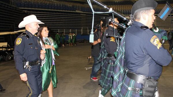 Gloria Garza was escorted by the Bexar County Sheriff to her high school graduation. Her father was killed in the line of duty.