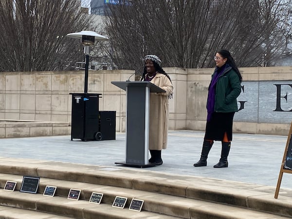 Ky Lindberg, left, speaks at a rally outside the Capitol on January 23. Lindberg leads the organization, Healthy Mothers, Healthy Babies. She also serves on the Georgia Maternal Mortality Review Committee. (Credit: Samantha Hogan/AJC)