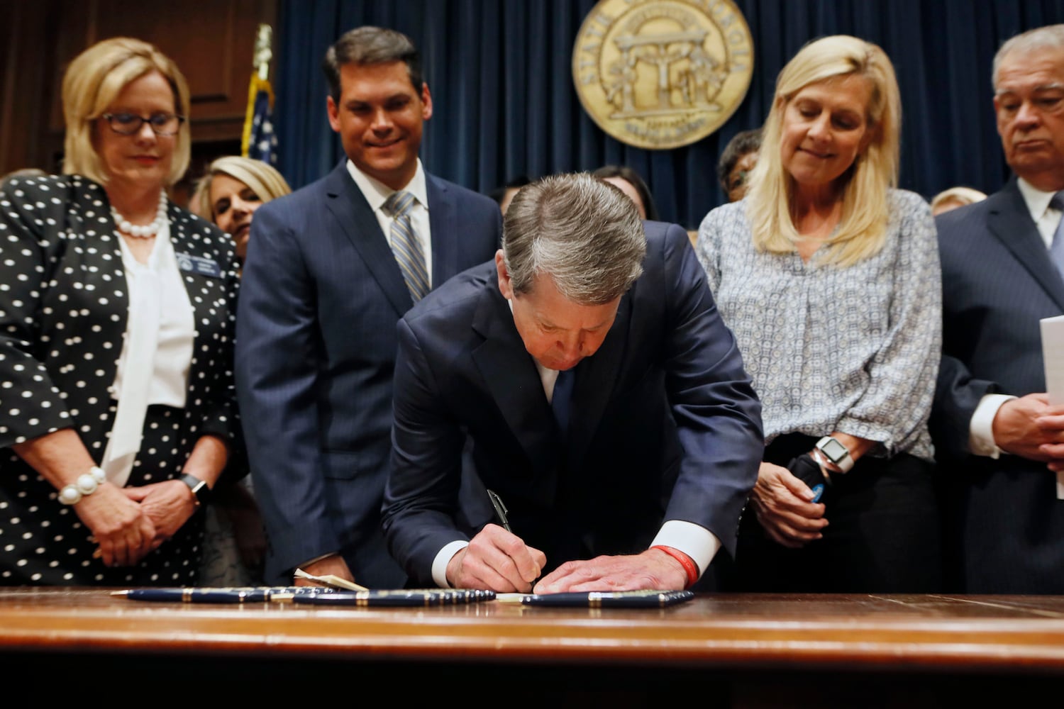 Photos: Gov. Kemp signs anti-abortion ‘heartbeat’ bill