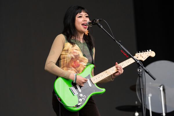 Beabadoobee performs at the Reading Music Festival, England, Saturday, Aug. 28, 2021. She'll open for Taylor Swift at Mercedes-Benz Stadium in Atlanta. (AP Photo/Scott Garfitt)