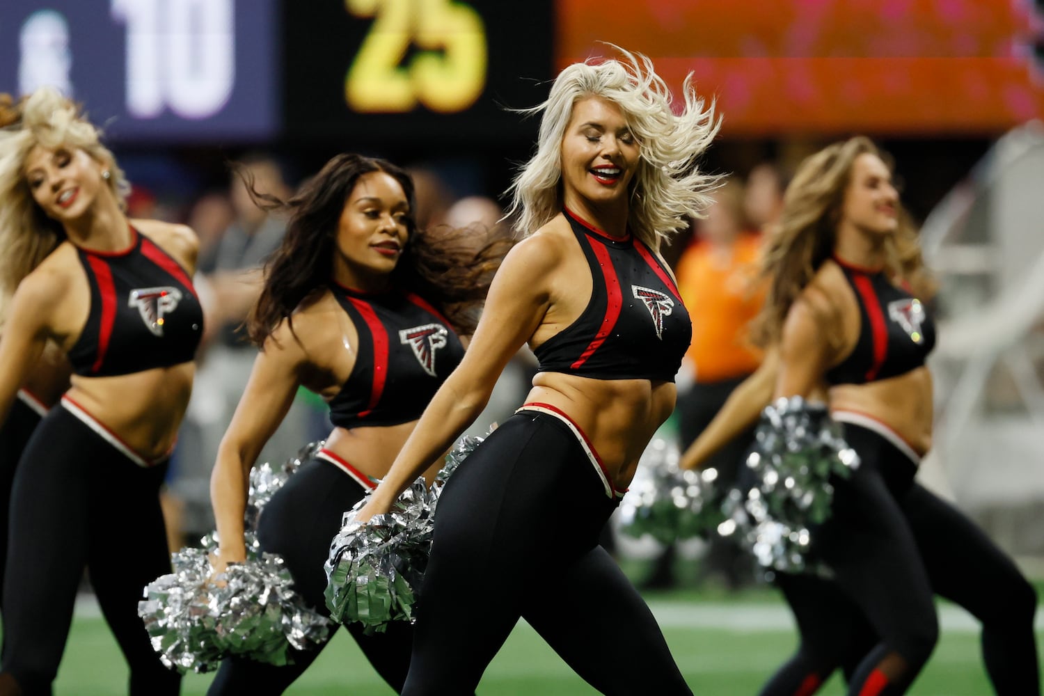 Falcons cheerleaders perform during a break Sunday in Atlanta. (Miguel Martinez / miguel.martinezjimenez@ajc.com)