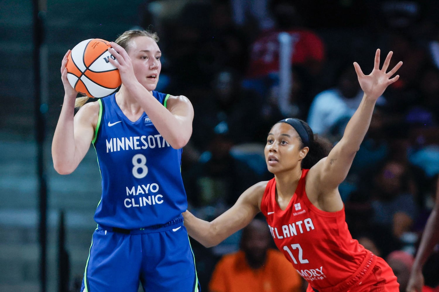 Atlanta Dream forward Nia Coffey (12) defends against Minnesota Lynx forward Alanna Smith (8) during the second half at Gateway Center Arena, Sunday, May 26, 2024, in Atlanta. (Miguel Martinez / AJC)