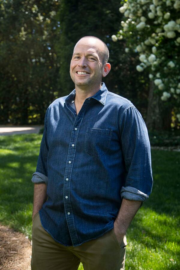 04/10/2020 - Brookhaven, Georgia  - Comedian and podcast host Paul Ollinger stands for a photo at his at his Brookhaven residence, Friday, April 10, 2020. Ollinger hosts the podcast "Crazy Money" from his home. (ALYSSA POINTER / ALYSSA.POINTER@AJC.COM)