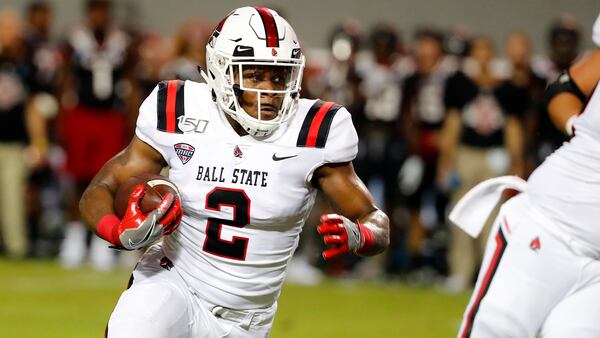 Ball State's Caleb Huntley (2) runs the ball against North Carolina State Saturday, Sept. 21, 2019, in Raleigh, N.C. (Karl B DeBlaker/AP)