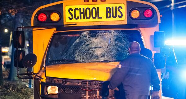 A motorcycle shattered the windshield of an Atlanta Public Schools bus after the two collided early Thursday morning.