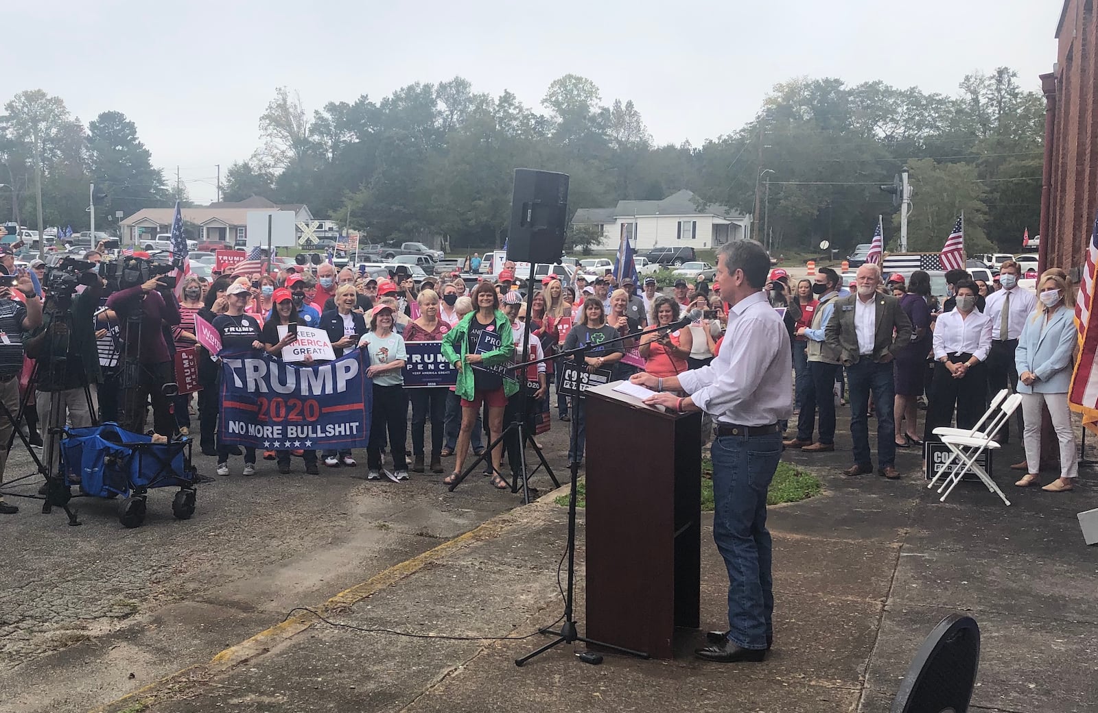 Gov. Brian Kemp speaks to a crowd of Republican supporters in Manchester, Ga. ahead of Joe Biden's visit to Georgia on Oct. 27, 2020.