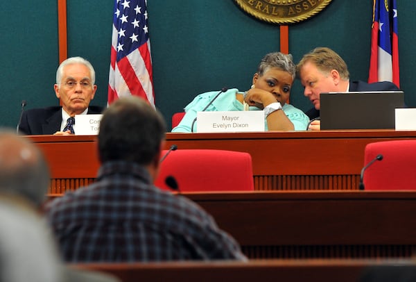 Riverdale Mayor Evelyn Wynn-Dixon (center) praised City Manager E. Scott Wood after his Tuesday firing and wished him well. 