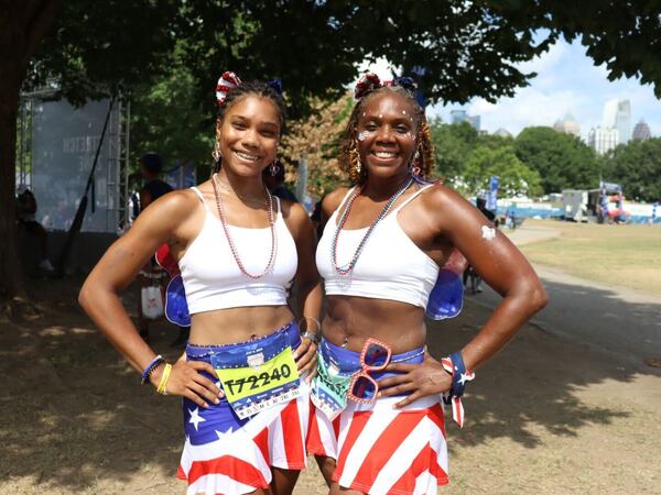 Kimberly Alexander, with her daughter Emily, after finishing the AJC Peachtree Road Race on July 4, 2024.