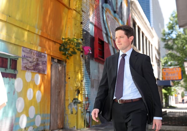 Jake Nawrocki, President of Newport US RE, walks next to buildings the firm has purchased on Broad Street on Monday, June 26, 2016, in Atlanta, Ga. PHOTO / JASON GETZ