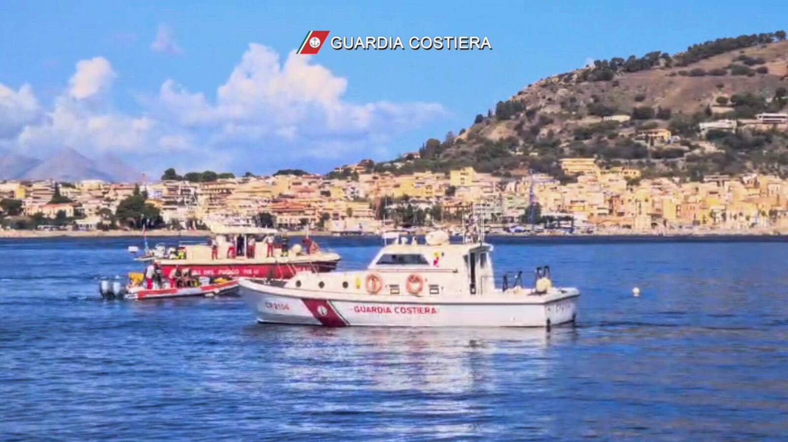 This picture taken from video released by the Italian Coast Guard on Monday, Aug. 19, 2024, shows the rescue operations in the stretch of Sea near Palermo, Sicily, in southern Italy, where the sail yacht Bayasian under UK flag sank early Monday. (Italian Coast Guard via AP, HO)