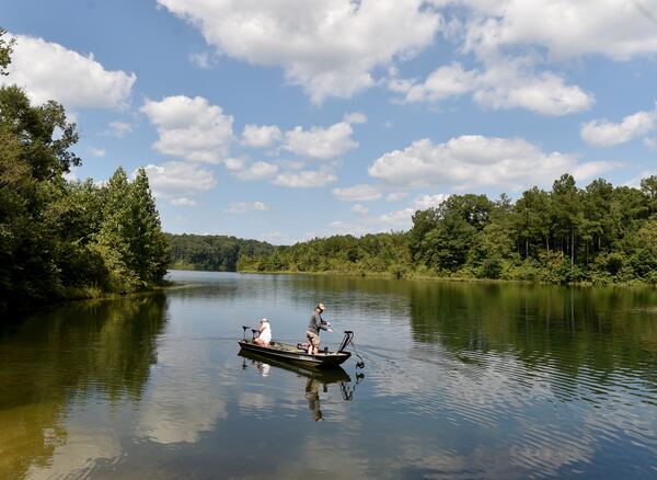 August 25, 2015 Gainesville, GA: Fisherman on the Cedar Creek Reservoir. Backers of the proposed Glades Reservoir, which would be located north of the current Cedar Creek Reservoir, have argued population growth in the region would make the project necessary. However, new population projections show the area growing much slower than anticipated. BRANT SANDERLIN/BSANDERLIN@AJC.COM