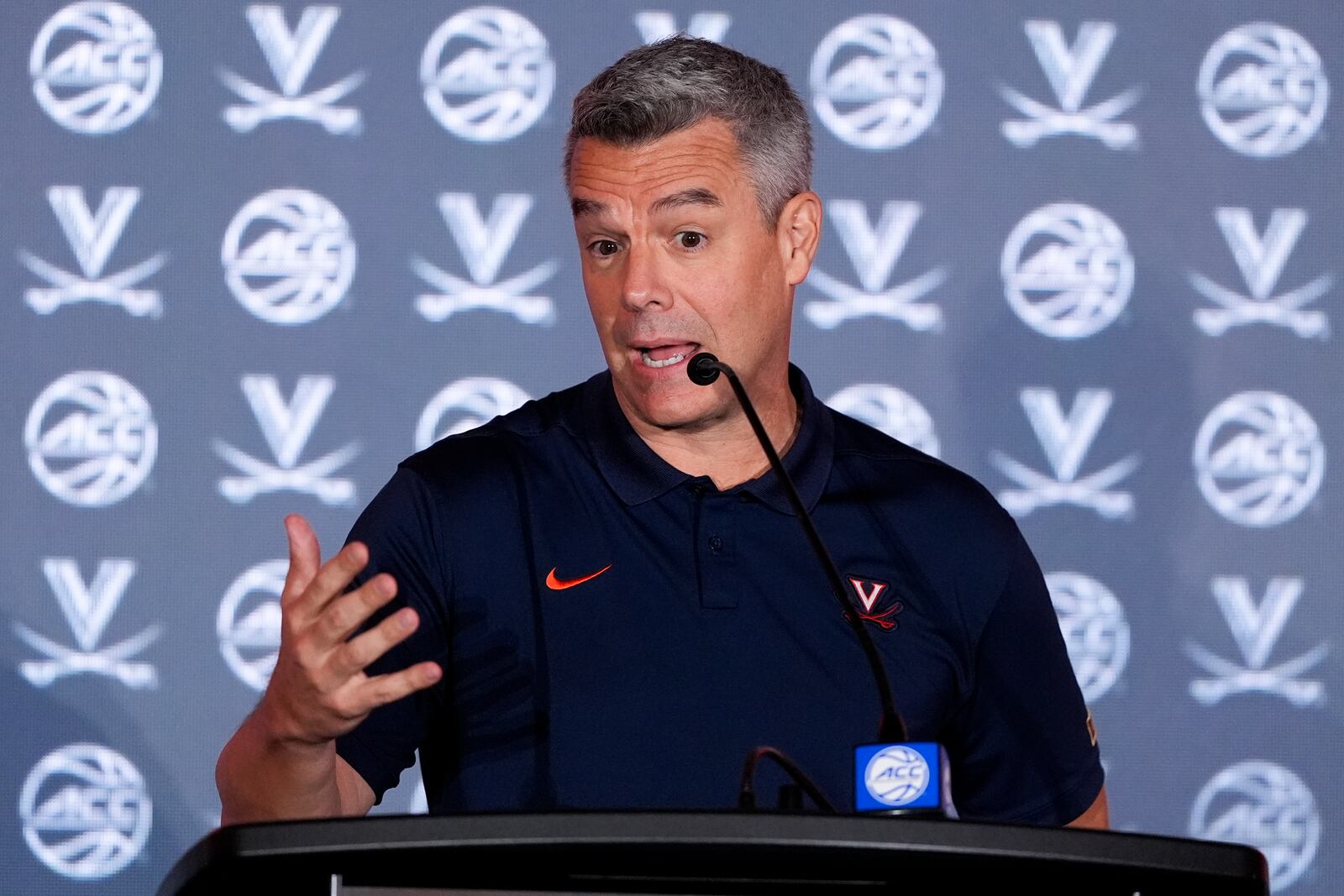 Virginia head coach Tony Bennett speaks during a ACC men's NCAA college basketball media day, Thursday, Oct. 10, 2024, in Charlotte, N.C. (AP Photo/Chris Carlson)